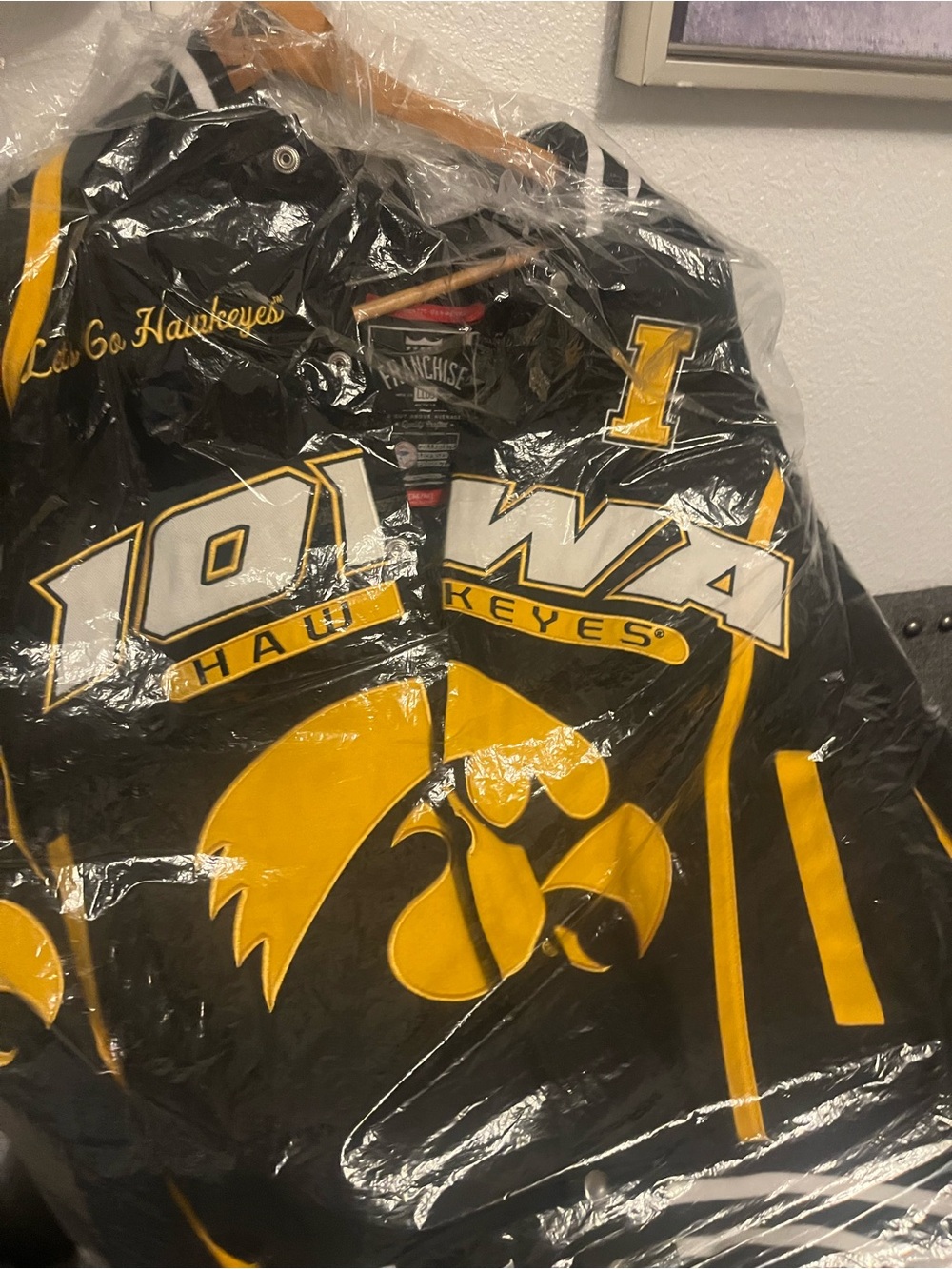 Iowa Hawkeyes Black & Gold Varsity Bomber Jacket. Lol, made it all way to Texas